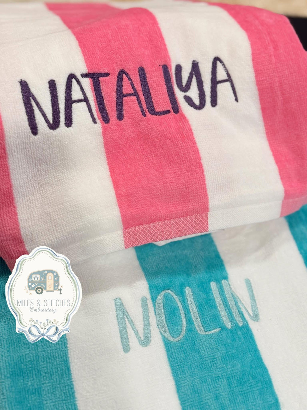 Embroidered striped beach towel