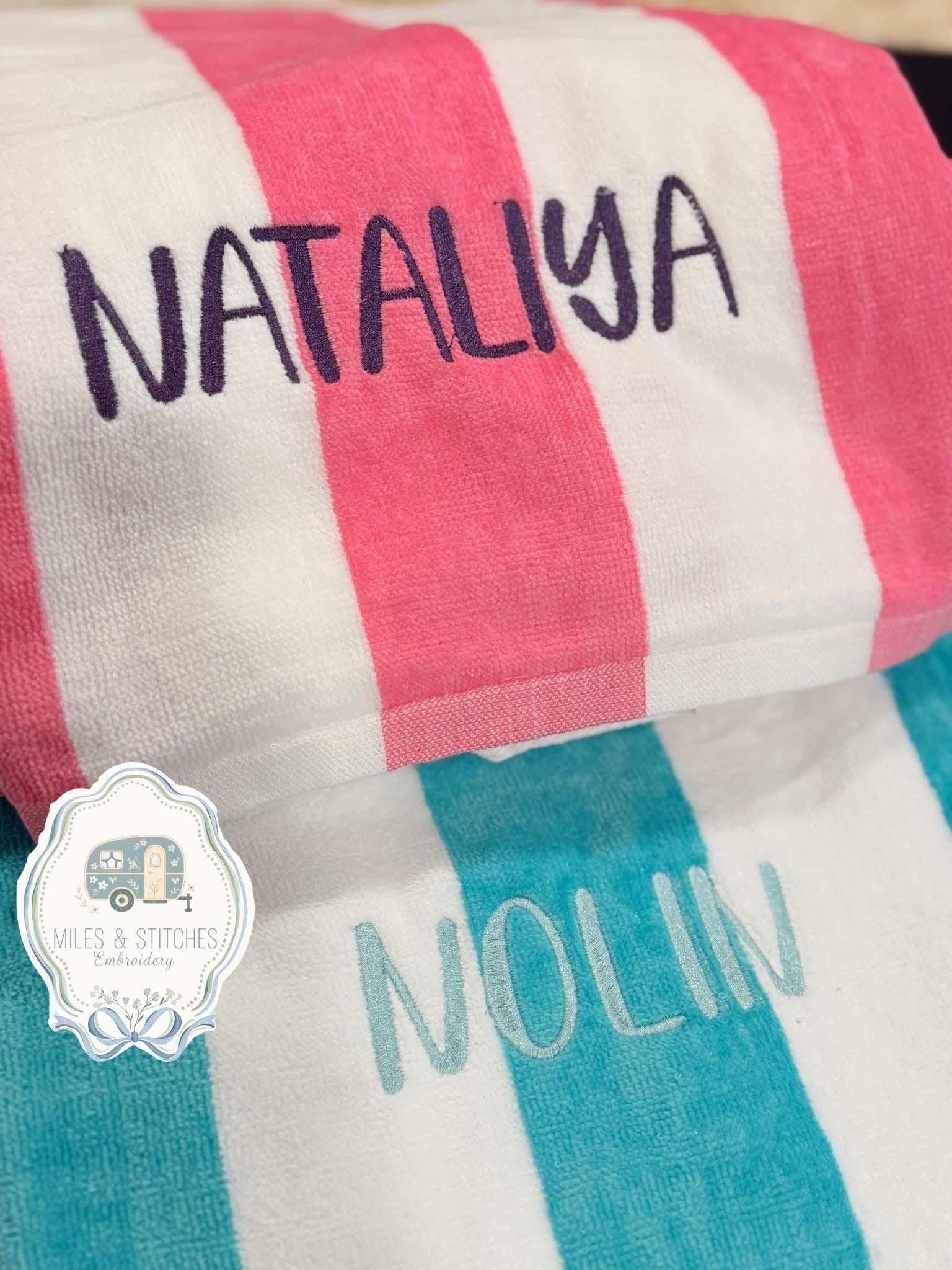 Embroidered striped beach towel