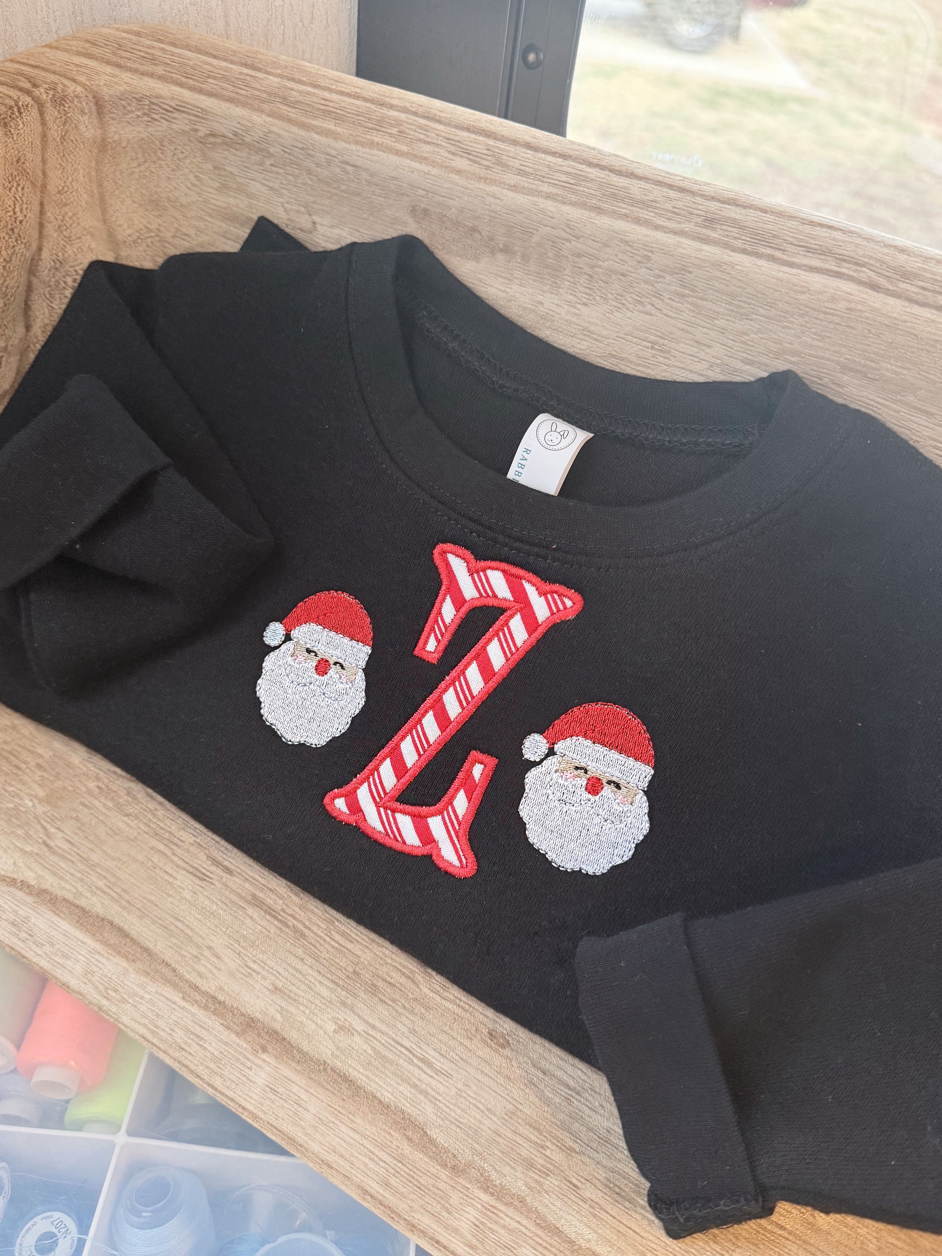 Appliqué Santa initial sweatshirt