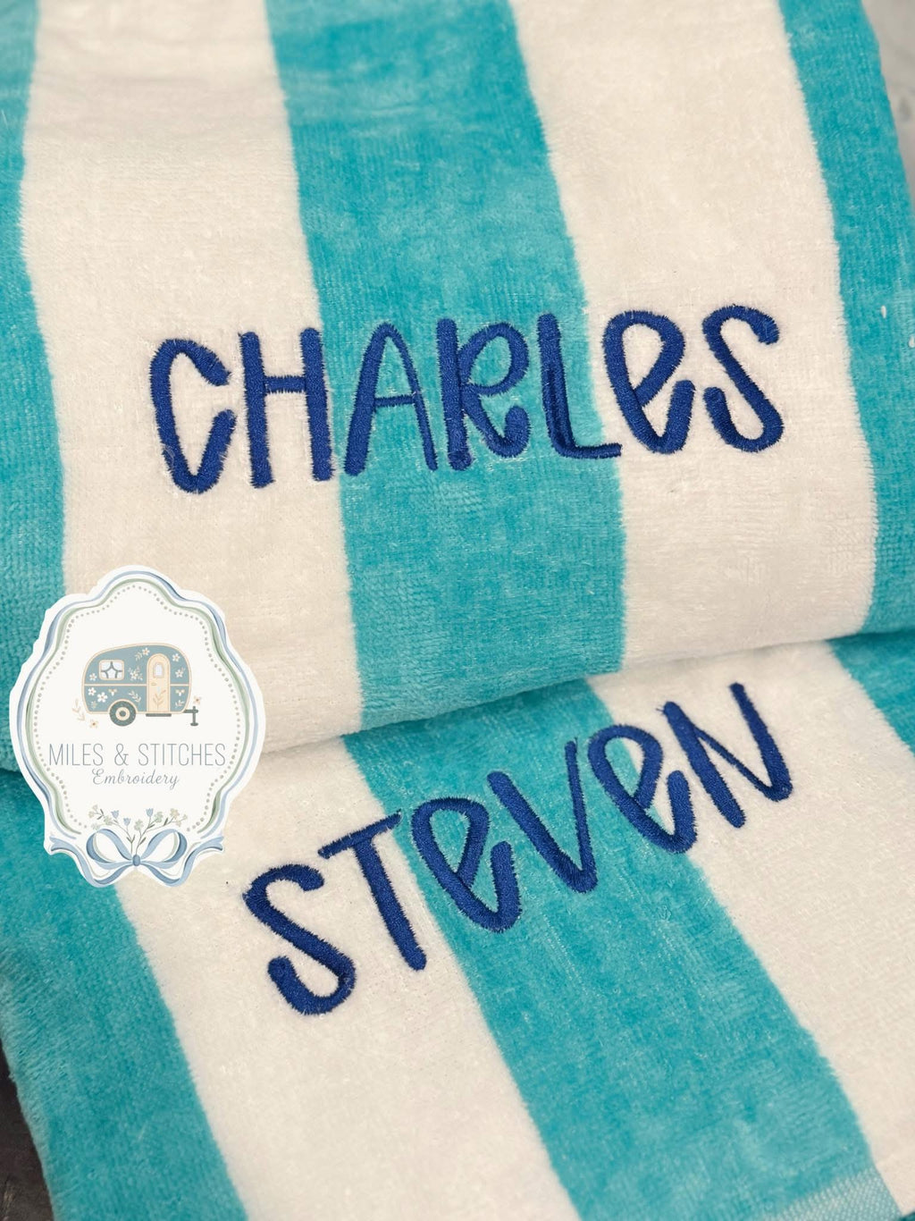 Embroidered striped beach towel